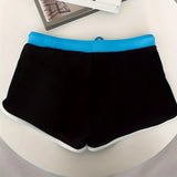 Dieter – schwarze Herren-Badeshorts im Ozean-Look